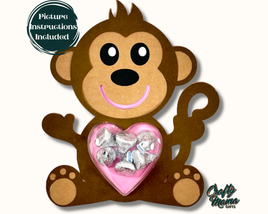 a monkey holding a heart filled with candy