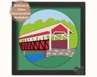 a picture of a red covered bridge