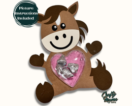 a brown horse with a pink heart shaped candy