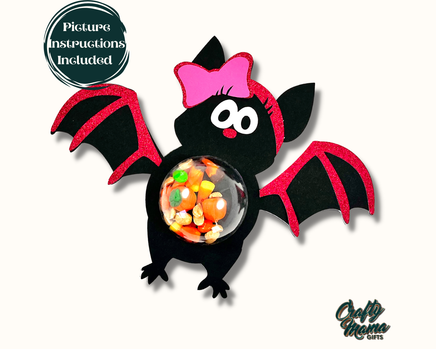 a bat with a candy bowl in its mouth