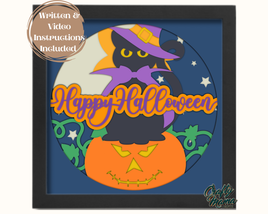 a picture of a black cat wearing a witches hat and sitting on top of a