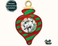 a red and green ornament filled with candy