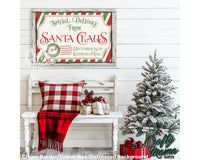 a white bench sitting next to a christmas tree