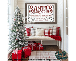 Santa&#39;s workshop sign in a living room with a christmas tree and presents