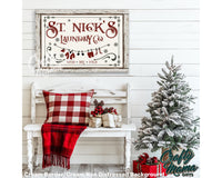 St. Nick&#39;s laundry room farmhouse sign in a room with a white bench sitting next to a christmas tree