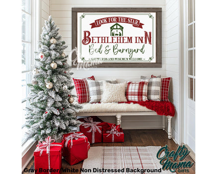 A Christian Christmas sign in a living room with a christmas tree and presents