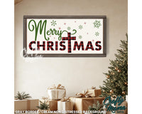 a picture of a christmas sign hanging on a wall