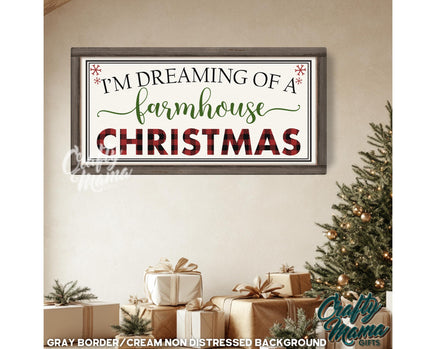 a picture of a christmas sign hanging on a wall