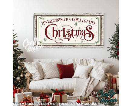 a living room with a couch and christmas decorations