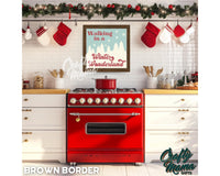 a red stove top oven sitting inside of a kitchen