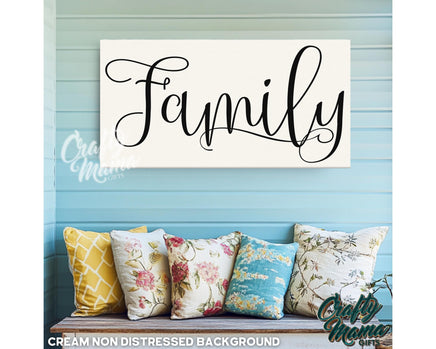 a family sign hanging on the wall above a couch