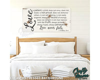 a bed with white linens and a wooden headboard