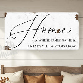 a sign that says home where family gathers