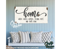 a wooden sign that says home on it