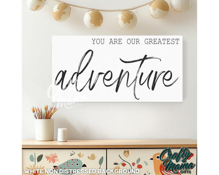 a picture of a sign that says you are our greatest adventure