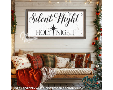 a wooden bench sitting under a sign that says silent night holy night