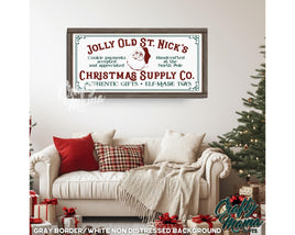 Vintage Santa sign in a living room with a couch and a christmas tree