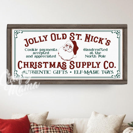 Vintage Santa sign in a living room with a couch and a christmas tree