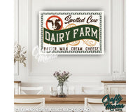 a dairy farm sign hanging on a wall