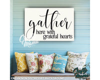 a sign that says gather here with grateful hearts