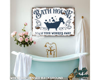 a bath room with a bath tub and a sign