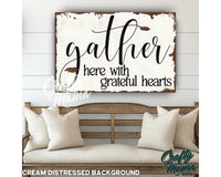 a wooden sign that says gather here with grateful hearts