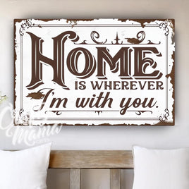 a wooden sign that says home is wherever i&#39;m with you