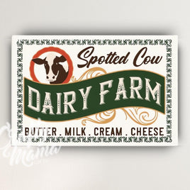 a dairy farm sign hanging on a wall