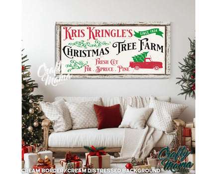 a christmas sign hanging on the wall of a living room