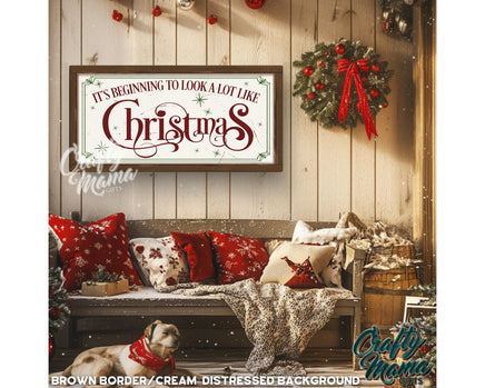 a picture of a christmas sign hanging on a wall
