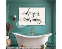 a bathroom with a bathtub and a painting on the wall