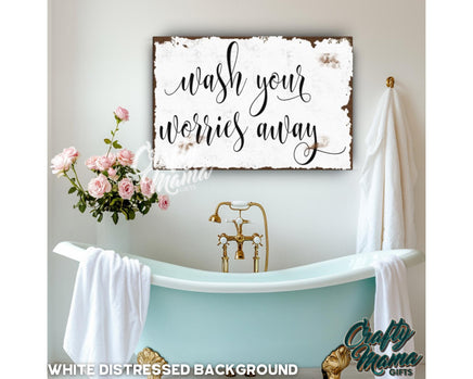 a bathroom with a bathtub and a sign that says wash your hands away