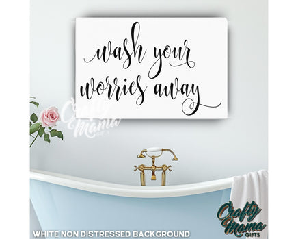 a bathroom with a sign that says wash your weirdies away
