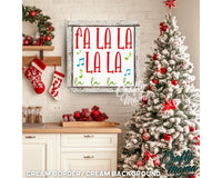 a decorated christmas tree in front of a white brick wall