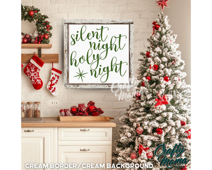 a decorated christmas tree in front of a white brick wall
