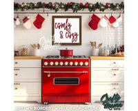 a red stove top oven sitting inside of a kitchen