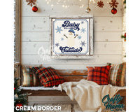 a picture of a snowman hanging on a wall