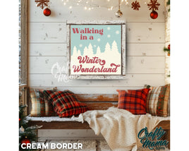 a picture of a winter wonderland hanging on a wall