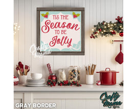 a picture of a christmas sign hanging on a wall