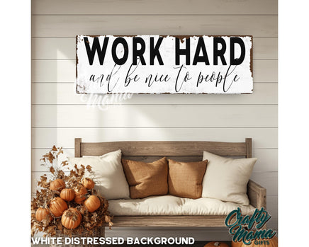 a wooden sign that says work hard and be nice to people