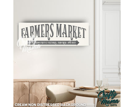 a sign that says farmers market hanging on a wall