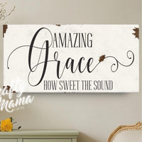 a white sign that says amazing grace on it