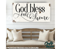 a wooden sign that says god bless our home