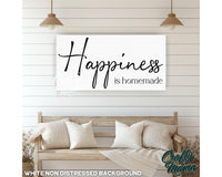 a picture of a couch with pillows and a sign that says happiness is homemade