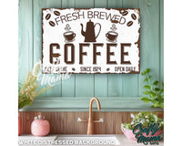 a sign that says fresh brew coffee above a kitchen sink