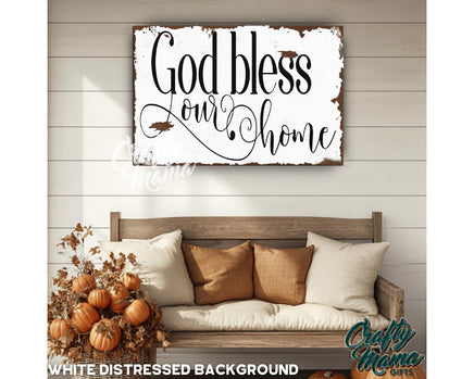 a wooden sign that says god bless our home