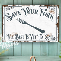 a sign that says save your fork the best is yet to come