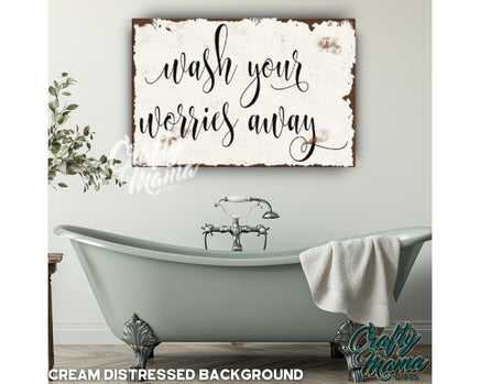 a bathroom with a bathtub and a sign on the wall