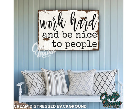 a wooden sign that says work hard and be nice to people