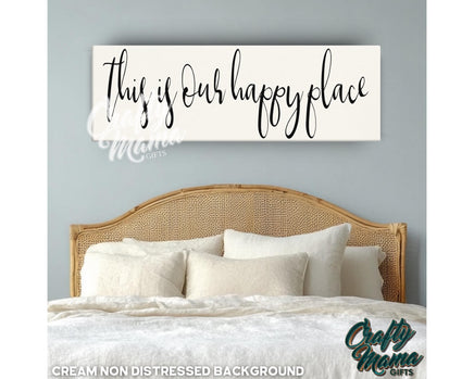 a bedroom with a bed and a sign that says, this is our happy place